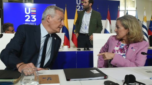 French Finance Minister Bruno Le Maire, left, and Spanish Economy Minister Nadia Calvino, right, expressed support for the subsidies probe