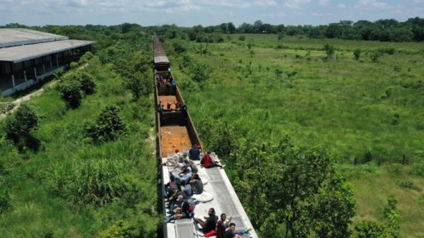 Migrants often climb on freight trains - including this one known as "The Beast" - on a dangerous journey through Mexico to the United States