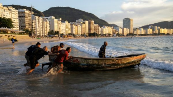 Long before acquiring its high-rises and international fame, Brazil's Copacabana beach was home to artisanal fishermen, who still ply the waters today
