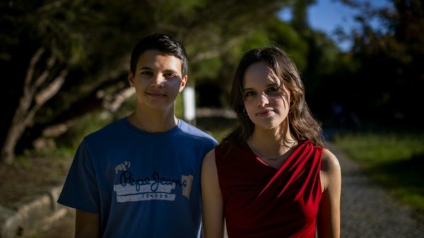 Sister and brother Sofia Oliveira, 18, and her brother Andre, 15, are among the young Portuguese people taking the case