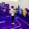 Visitors at the Asian Games eSports venue try out some tech