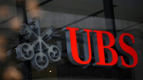 UBS's plans for its recently-swallowed rival Credit Suisse -- particularly the fate of its investment bank and Swiss retail banking operations -- are top on investors' minds when it announces second quarter earnings