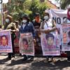 Relatives of 43 Mexican students who disappeared in 2014 protest outside the Israeli embassy in Mexico City to demand the extradition of a fugitive former investigator