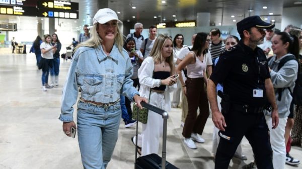 Spain midfielder Alexia Putellas arrives at Valencia airport on the way to the training camp