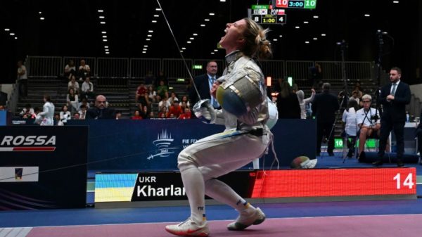 Ukraine's Olha Kharlan celebrates beating Russian Anna Smirnova competing as a neutral in the first meeting of an athlete representing Ukraine against a Russian since the 2022 invasion