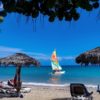 Tourists enjoy the sunshine at Jibacoa Beach, in Cuba's Mayabeque Province, on August 1, 2022; the country says tourism is recovering from a dropoff the last two years
