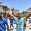 People demonstrate over the rise in the cost of living in the town of Petit-Goave, Haiti