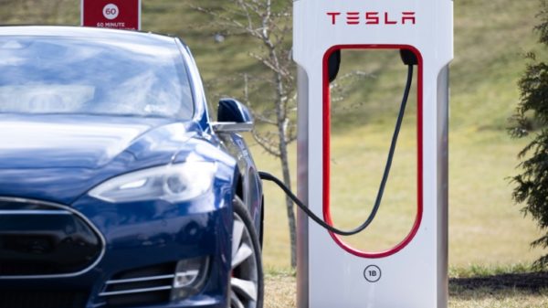 A Tesla Model S is plugged into a charging station in Falls Church, Virginia in February 2023